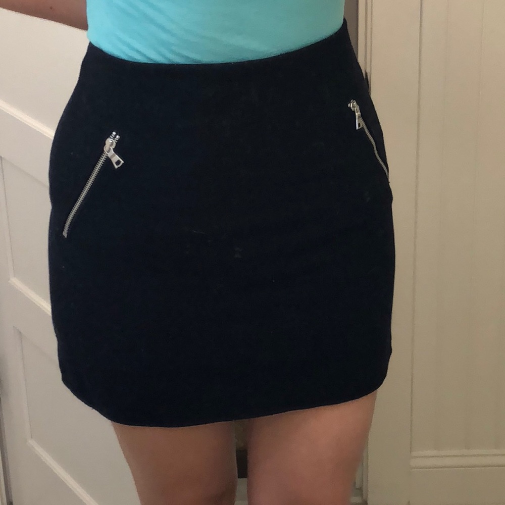 Black skirt with silver zippered side pockets